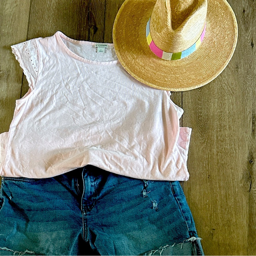 Light pink top with cute sleeve detail ! Size large . J Crew